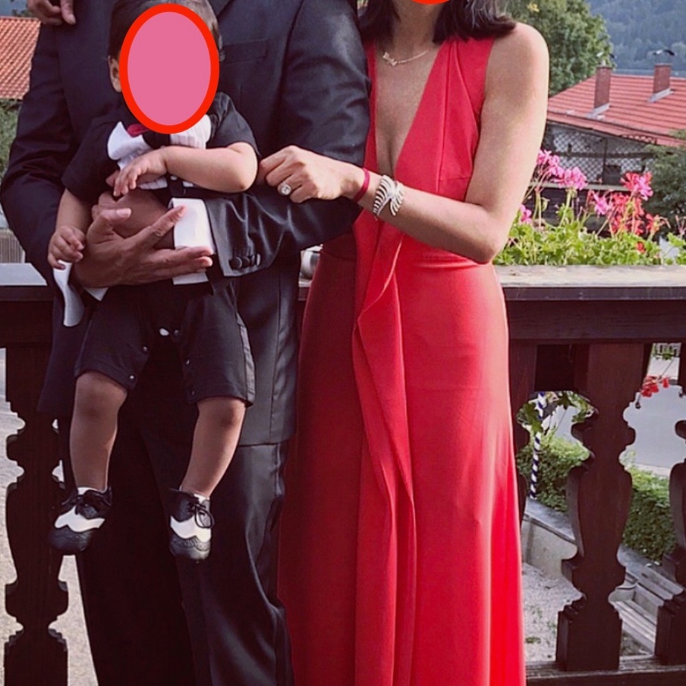 Redish orange crepe gown